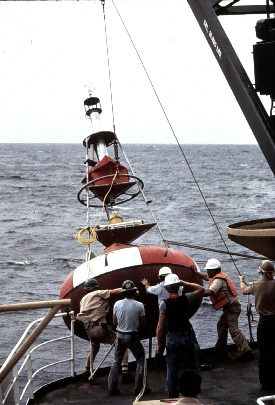 Deploying deep-ocean oceanographic buoy