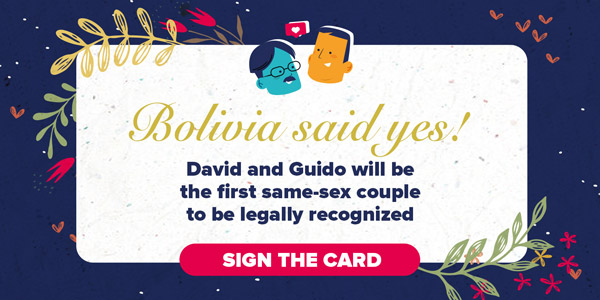 The image evokes a congratulations card for David and Guido.The text says: David and Guido will be the first same-sex couple to be legally recognized. The button says: Sign the card