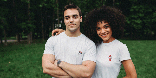 A gif showing people wearing a range of All Out t-shirts and a hat, an an All Out mug, phone case.
