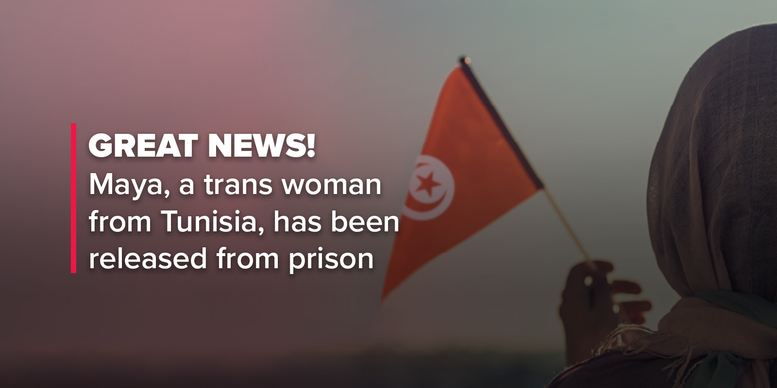 Picture: the back of a woman with a head scarf, holding a small tunesian flag. Text: Great news! Maya, a trans woman from Tunisia, has been released from prison.