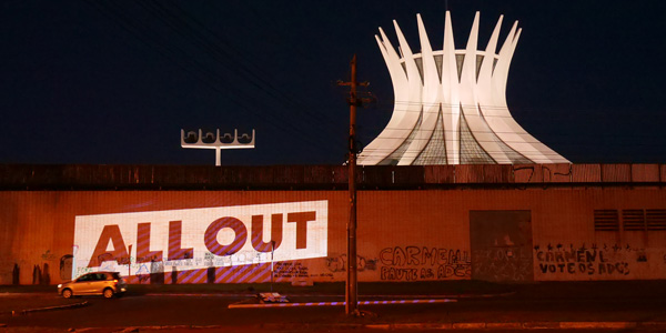 Projection of the All Out logo in Brasília.