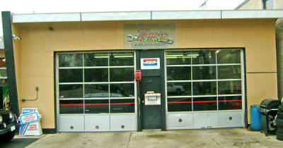 Tom's Service Center Logo