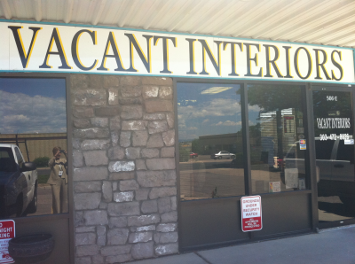 Vacant Interiors, Inc. Logo