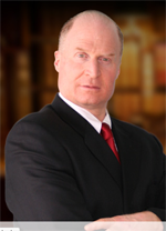 Law Offices Of Christopher Trainor &amp; Associates Logo