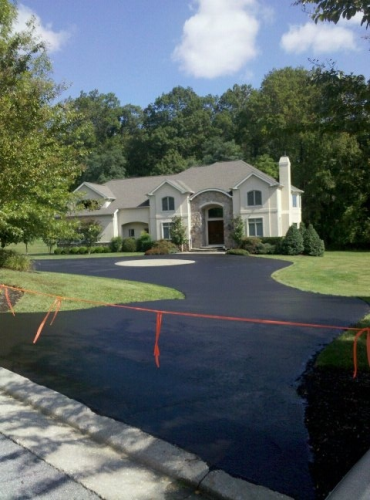 Olinger David Asphalt Paving and Seal Coating Logo
