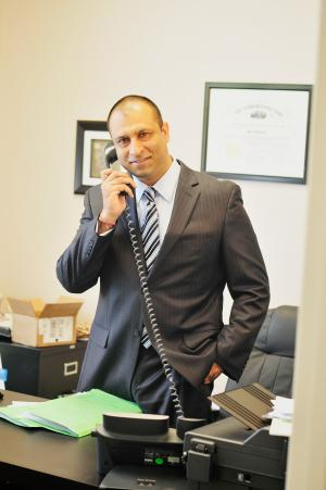 The Sharma Law Firm Logo