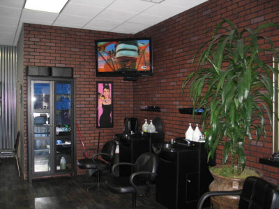 Neptunes Den Cuts For Men Logo