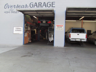 Overseas Garage &amp; Towing Logo