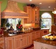 Dennis Jacobs Construction &amp; Home Building Logo