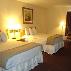 Stay Express Inn &amp; Suites Logo