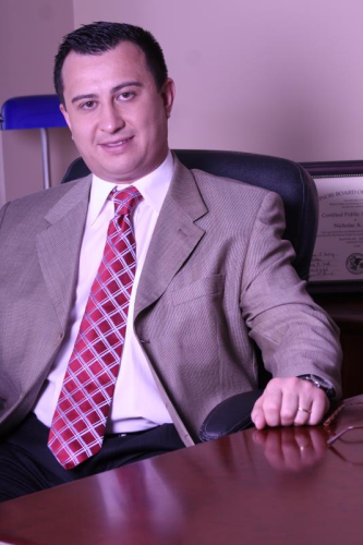 Cumming Tax &amp; Accounting Logo