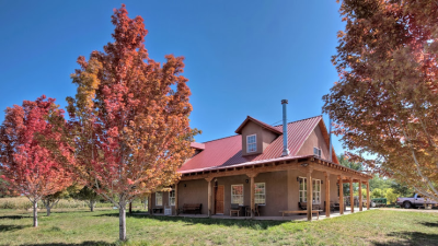 Rush Van Camp - Santa Fe Real Estate Logo