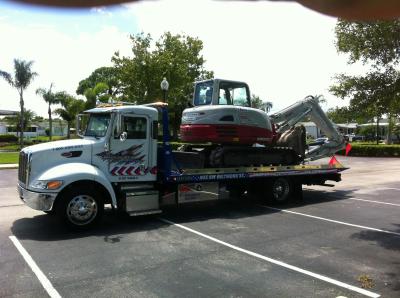 Reliable Towing &amp; Storage Logo