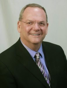 Robert O. Kelly, DDS, FAGD Logo