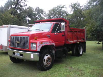 Travis Long Construction &amp; Equipment Services Logo