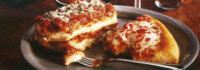 Numero Uno Pizza Pasta &amp; More Logo