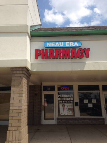 Neau Era Pharmacy Logo