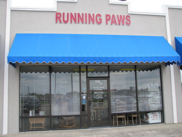 Running Paws Pet Hospital Logo