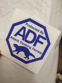 Sticker "Protected by ADF" Attack Dooking Ferrets Decal 4" Window/Locker/Car/Display Pride Die-Cut Sticker