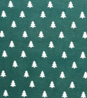 White trees on green flannel fabric