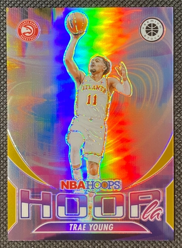 2023-24 Panini NBA Hoops Premium Stock - #15 Trae Young Hoopla Gold Prizm /10