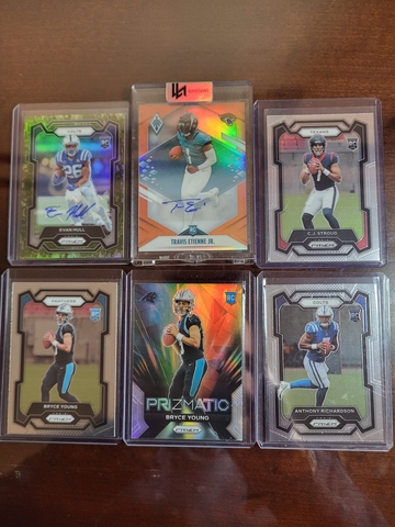 2021 phoenix travis Etienne auto /25 and 2023 prizm rcs