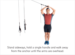 Stand sideways, hold a single handle and walk away from the anchor until the arms are overhead.