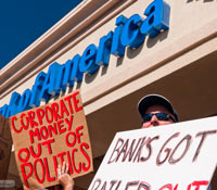 anonymous individual pocketing pesos -- turn on images