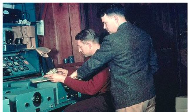 Hewlett and Packard in their garage workshop
