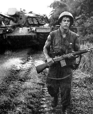 Johnson announces the decision to send 100,000 ground troops