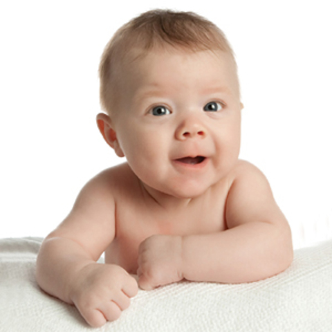 Can hold head up and begins to push up when lying on tummy