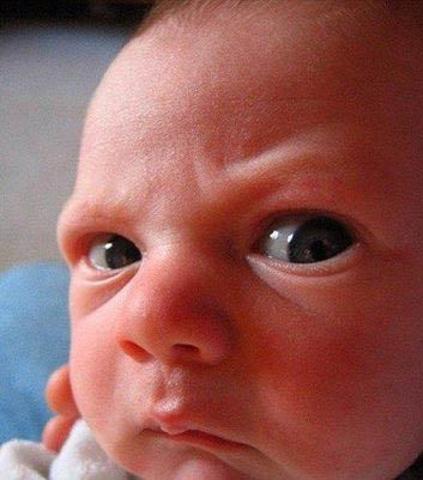 Copies some movements and facial expressions, like smiling or frowning