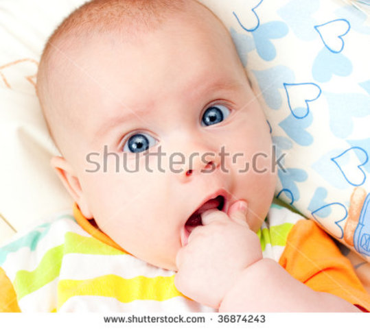 Brings hands to mouth