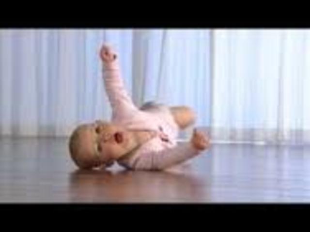 May be able to roll over from tummy to back