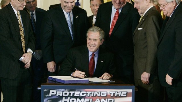 Bush Signs USA PATRIOT Act