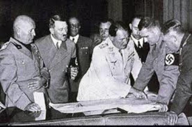 Germany, italy, Great Britain, and France sign the  Munich Agreement. (Appeasement)