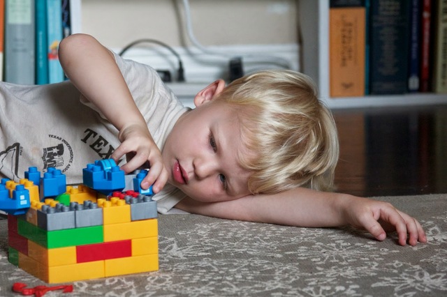 Plays simple make-believe games