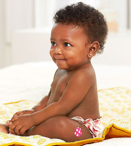 Baby begins to sit without support