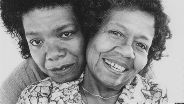 Who was may angelou raised by?