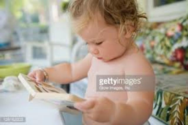 •Hands you a book when he wants to hear a story