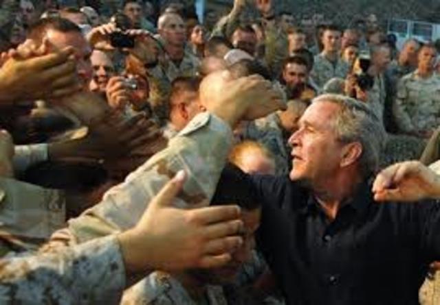 George W. Bush orders a troop surge