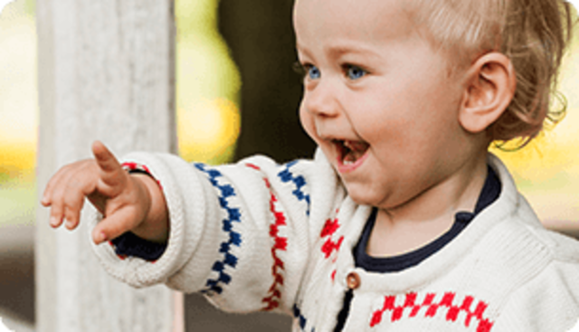 Uses fingers to point at things