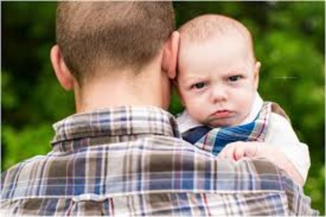 Copies movements, facial expressions, like smiling or frowning