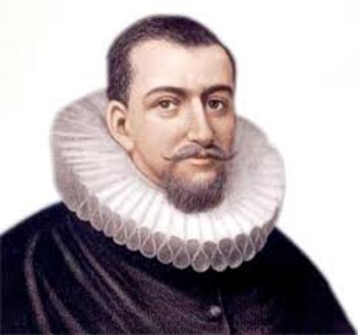 Henry Hudson, exploring for the Netherlands, claims land that will become New Netherland.