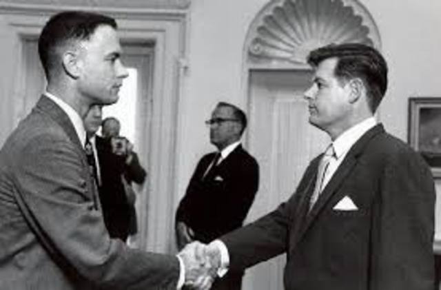 JFK meets with all American football players