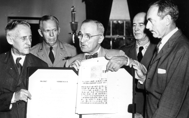 Truman Signs Peace Treaty ends World War 2
