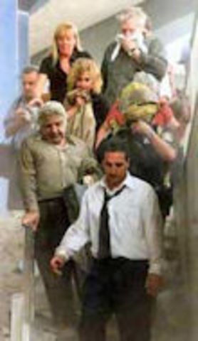 People begin evacuating WTCs