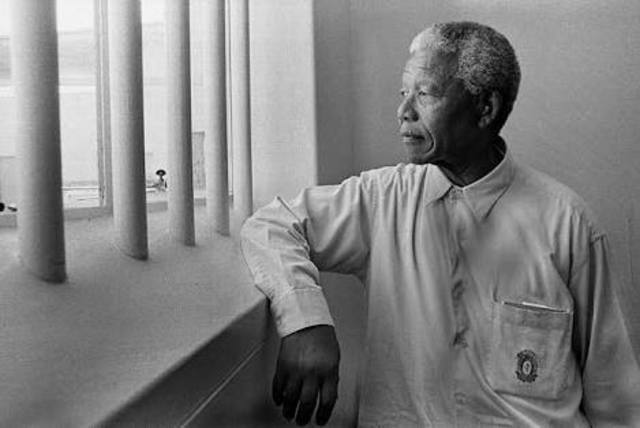 Captured and convicted of sabotage and treason and sentenced to life imprisonment at the age of 46, initially on Robben island where he would be kept for 18 years
