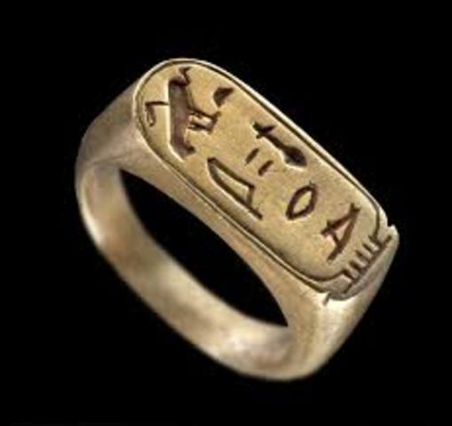 Ancient Egyptians were  making metal rings which some historians think they used as money.