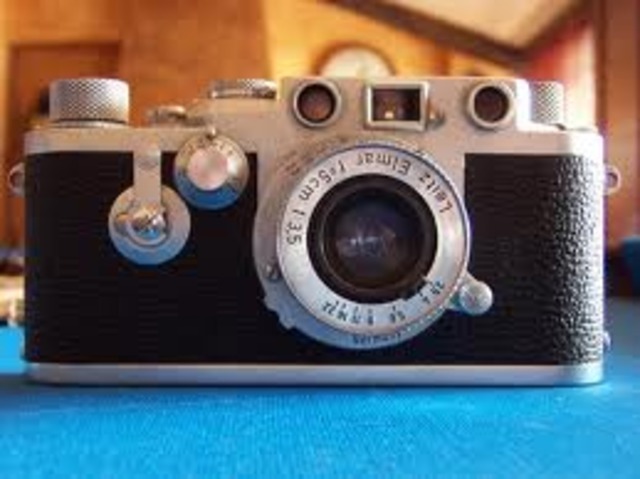 Mis padres se compran una cámara de fotos.